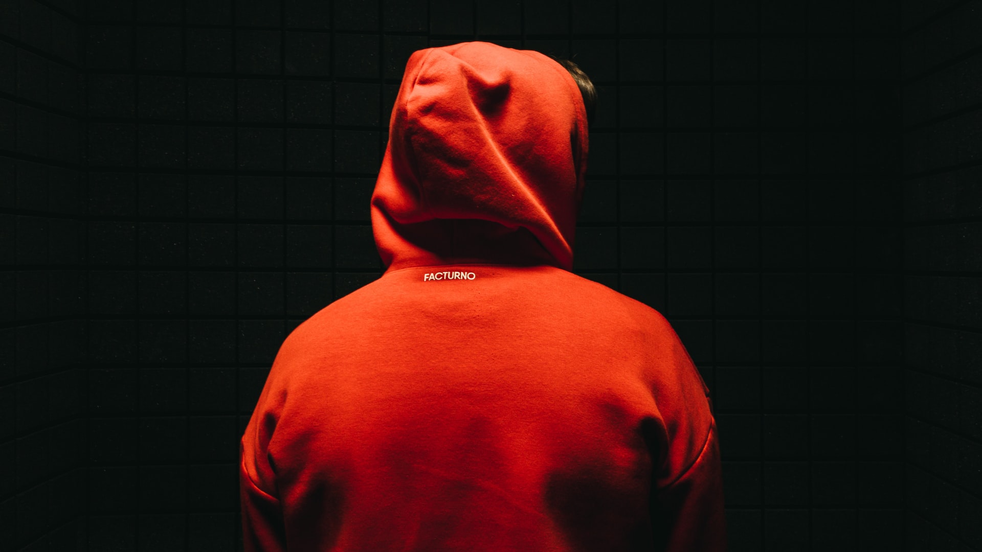 View of guy wearing a red hoodie from behind